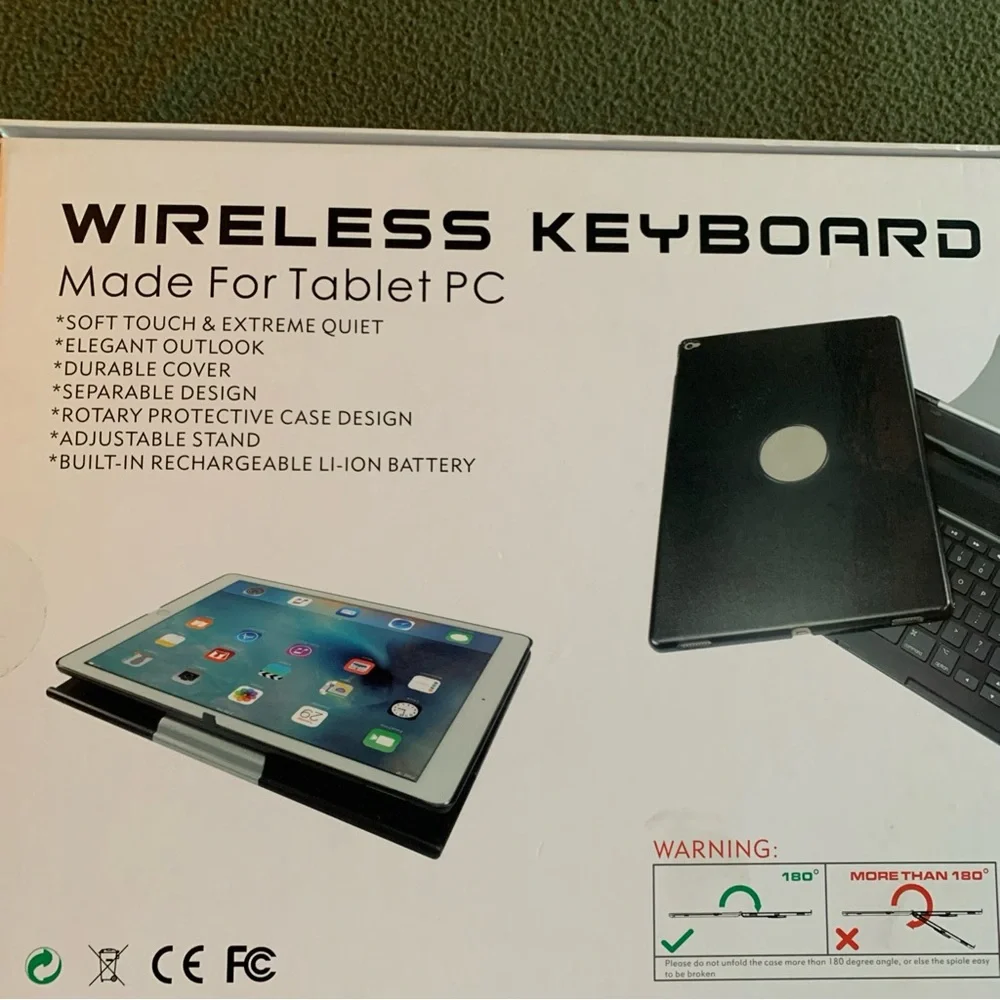 FUC ProCase keyboard case for iPad Pro 12.9”. Black and silver. Charging cord.